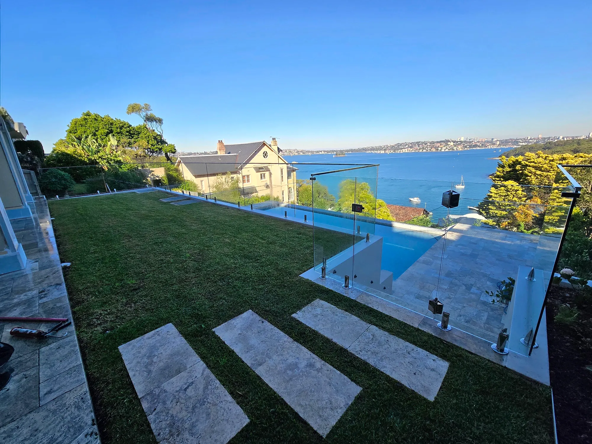 Architectural glass pool fencing on a Mosman property overlooking the harbour