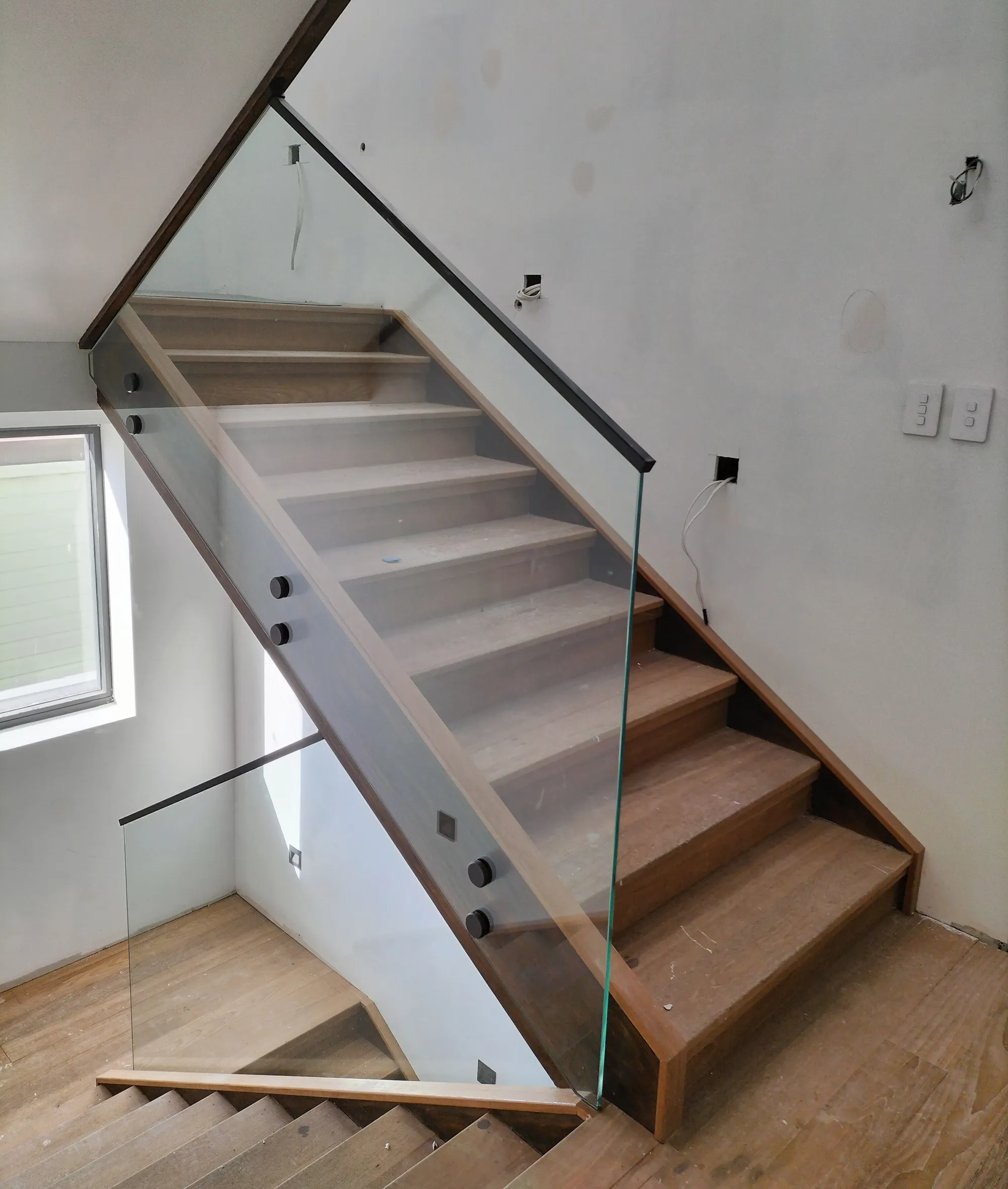 Frameless glass stair balustrade at a Sylvania residence