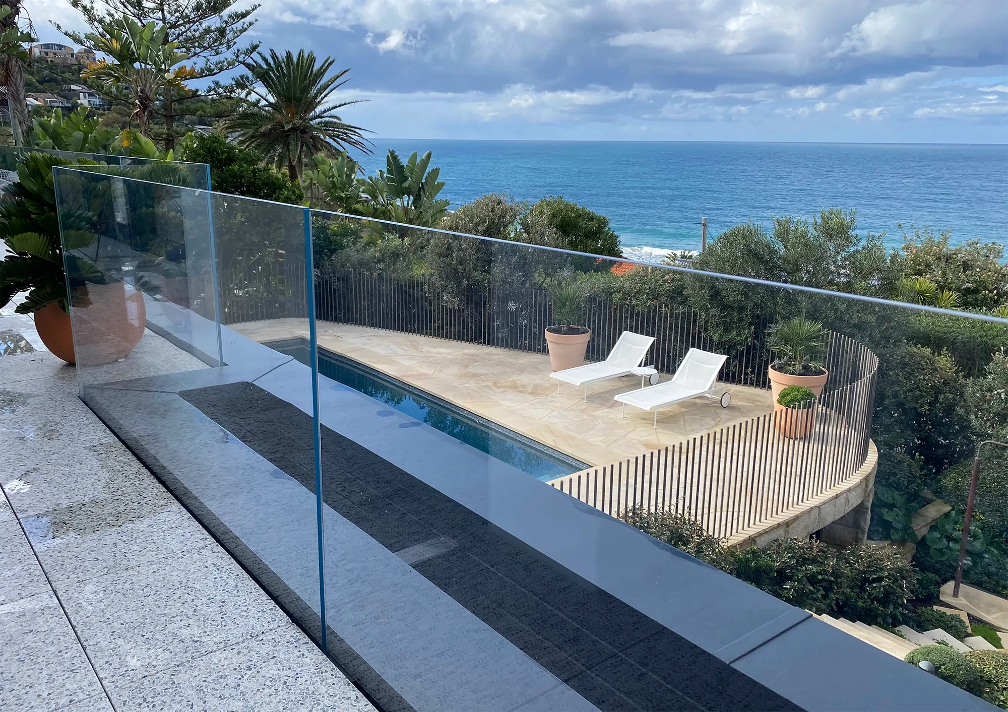 Frameless glass pool fencing overlooking the coast at Whale Beach