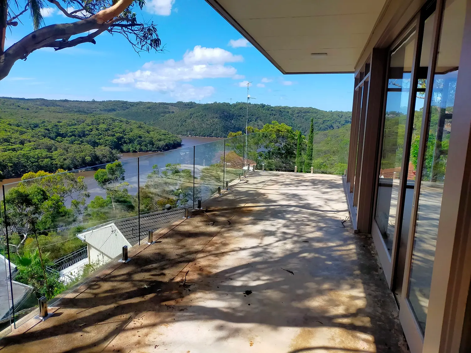 Glass balustrade looking out over a Sydney outlook